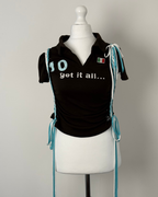 Black "kick the ball" Laddered Lace Polo